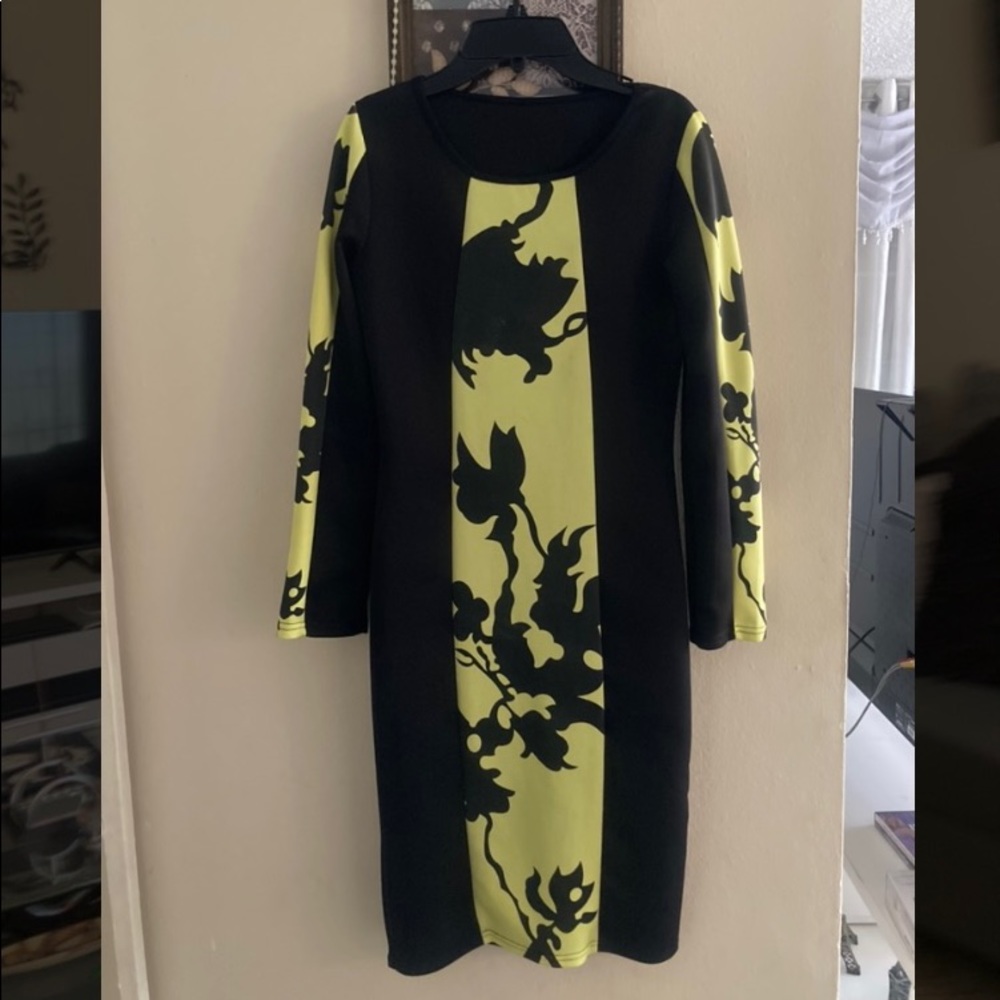 Black dress with yellow details.
